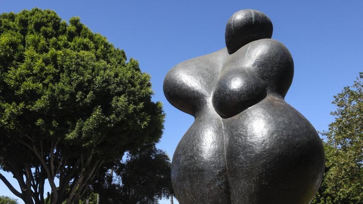 Kate Britton’s “Garnet” statue is an abstract depiction of a breast cancer survivor. The statue was originally located in front of the Village Centre in Arroyo Grande before later being moved to its current home in San Luis Obispo.