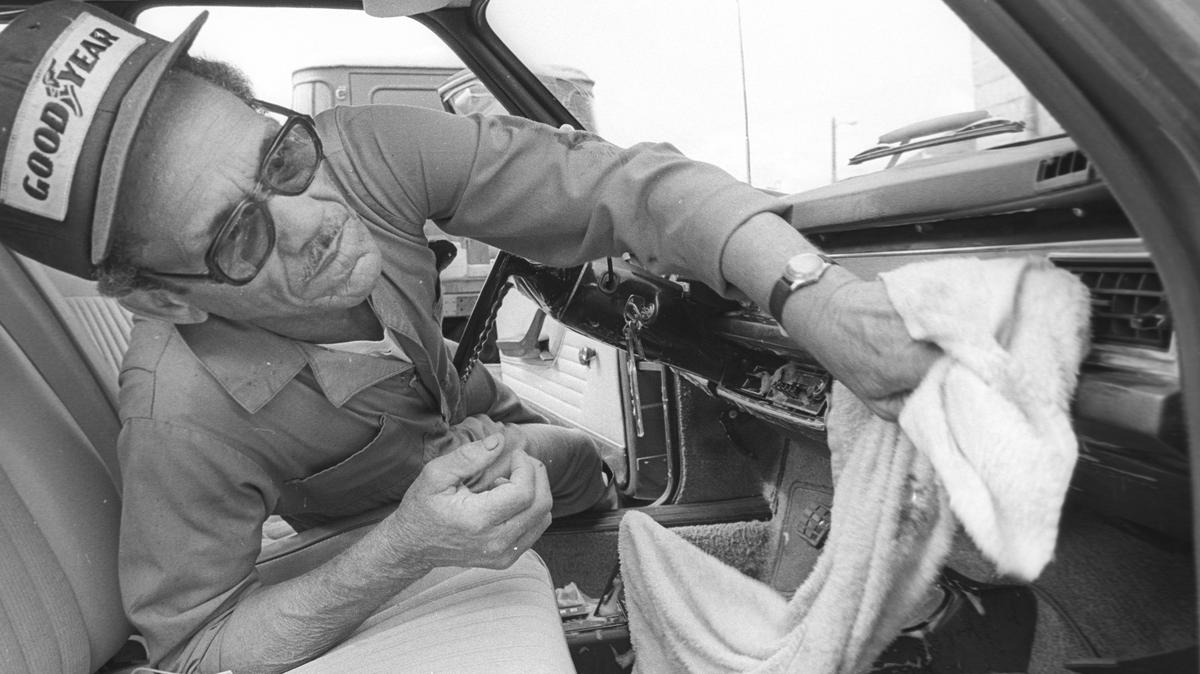 Aquire “Johnny” Johnson, pictured in 1978, washed, waxed and detailed cars for 26 years at the San Luis Auto Laundry on Higuera Street in San Luis Obispo.