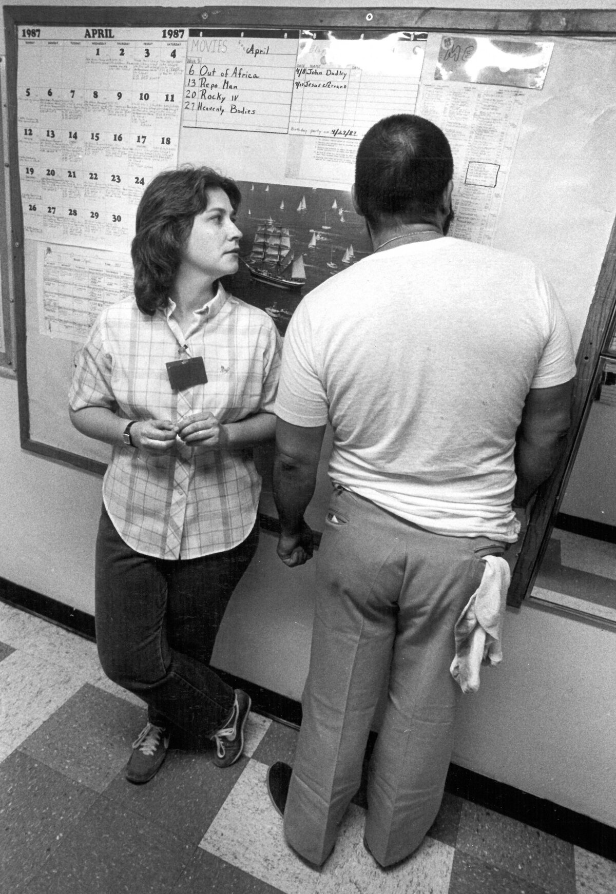 Psychiatric technician Tracy Jensen listens as a patient in Ward 12 reads a menu. Atascadero State Hospital was the world’s largest hospital for the criminally insane in 1987.