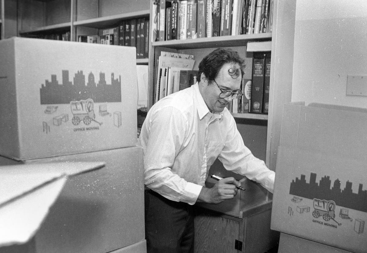 The Telegram-Tribune newsroom packs up to move from 1321 Johnson Ave. to 3825 S. Higuera. Reporter David Eddy marks boxes in the T-T library. David Middlecamp 4-9-1993