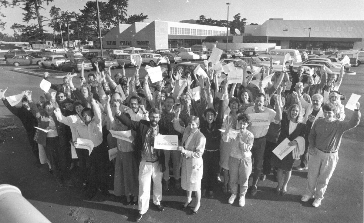 Staff members gather on April 12, 1993, for the first day of operations at the then-Telegram-Tribune building on South Higuera Street in San Luis Obispo. Editor Jeff Fairbanks and general manager Julia Aguilar stand at center. Joe Tarica, current Tribune editor, stands at far right.