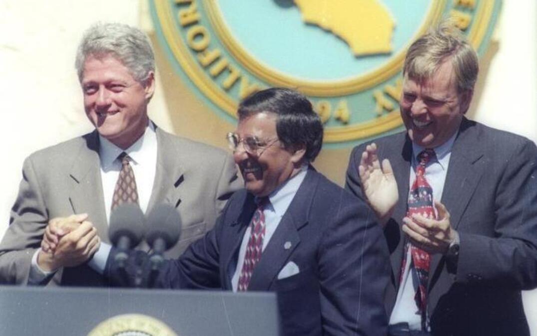 In a Sept. 4, 1995, photo, White House Chief of Staff Leon Panetta, center, introduces President Bill Clinton at the dedication of Cal State Monterey Bay. At right is Cal State Monterey Bay’s president, Peter Smith.