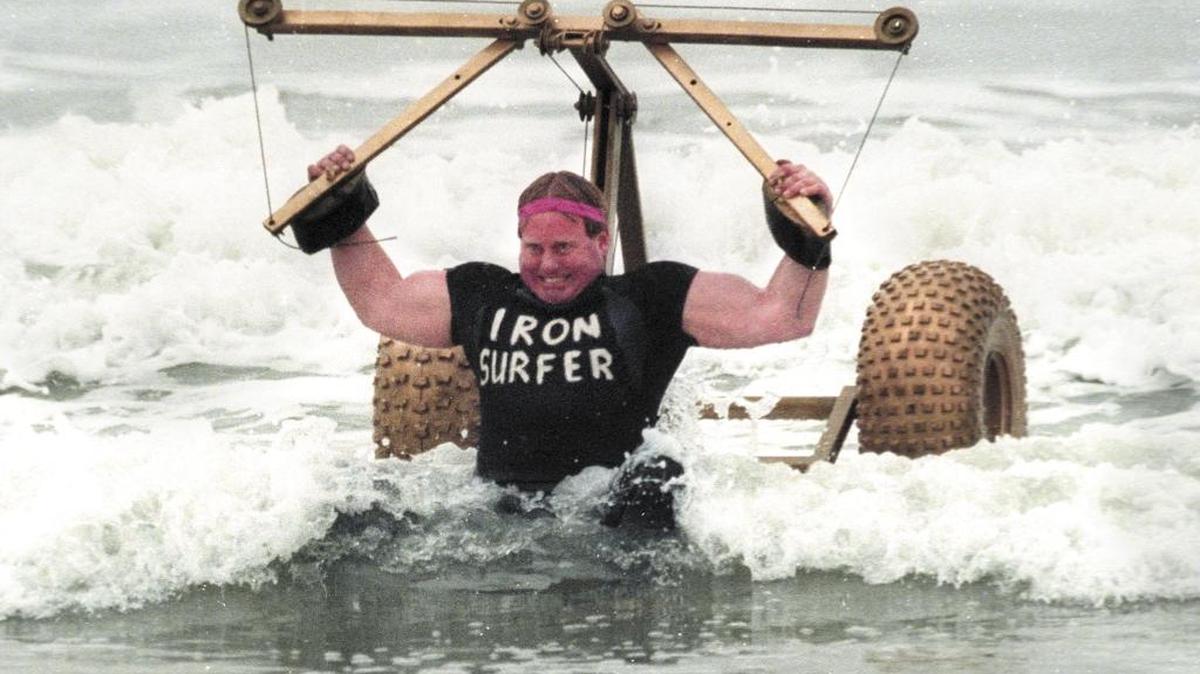 Brian Roberts works out on the Iron Surfer, his in-the-waves weightlifting invention, at the Grand Avenue ramp in Grover Beach in 1995.