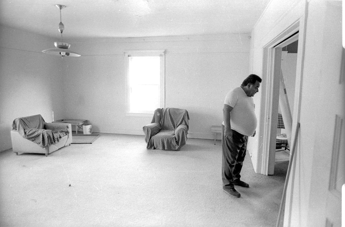 Park Hotel resident manager Roland Wilson walks through one of the larger rooms of the San Luis Obispo hotel as the remodel gets underway in 1982.