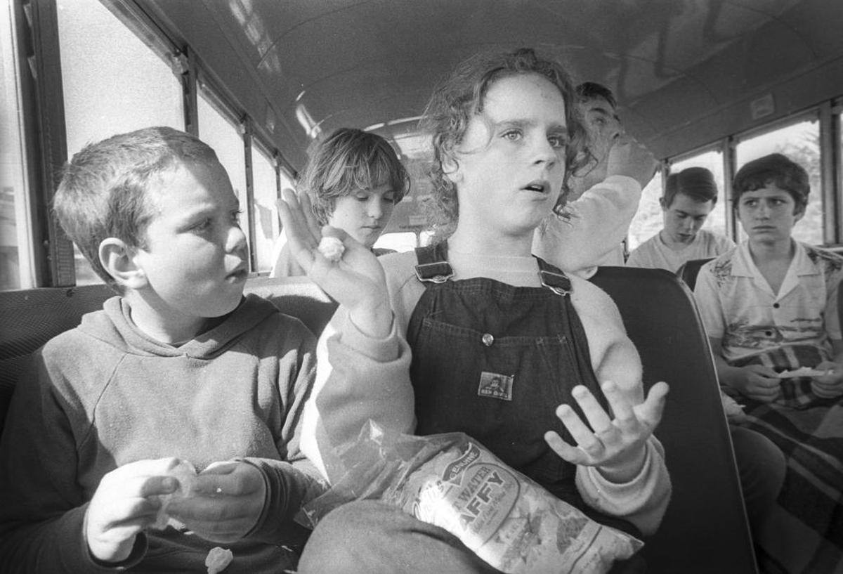 Ten-year-old Stephen O’Neal listens to his sister Barbara, 13, talk about how she reacted once she hit the water after the San Mateo flipped.