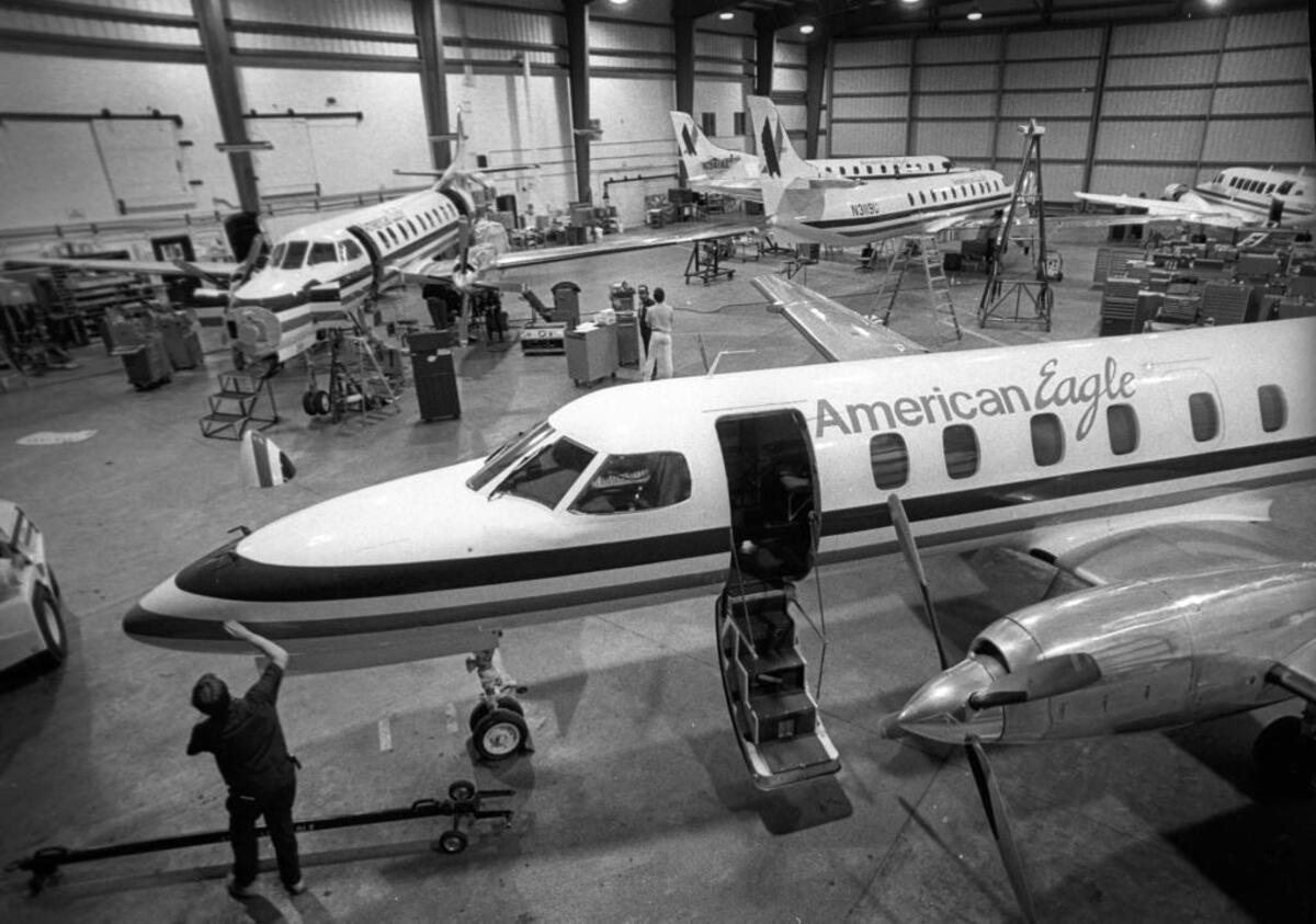 1987: A maintenance crew works on several of the Wings West/American Eagle fleet on Nov. 19, 1987. Wings West/American Eagle once had headquarters in San Luis Obispo with 250 employees. They maintained their fleet of aircraft at the San Luis Obispo airport.