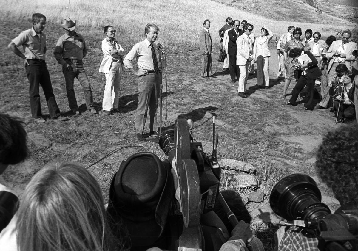 An army of journalists surrounds President Jimmy Carter during his visit Fresno to talk about the drought, part of a day trip to California on May 17, 1977.