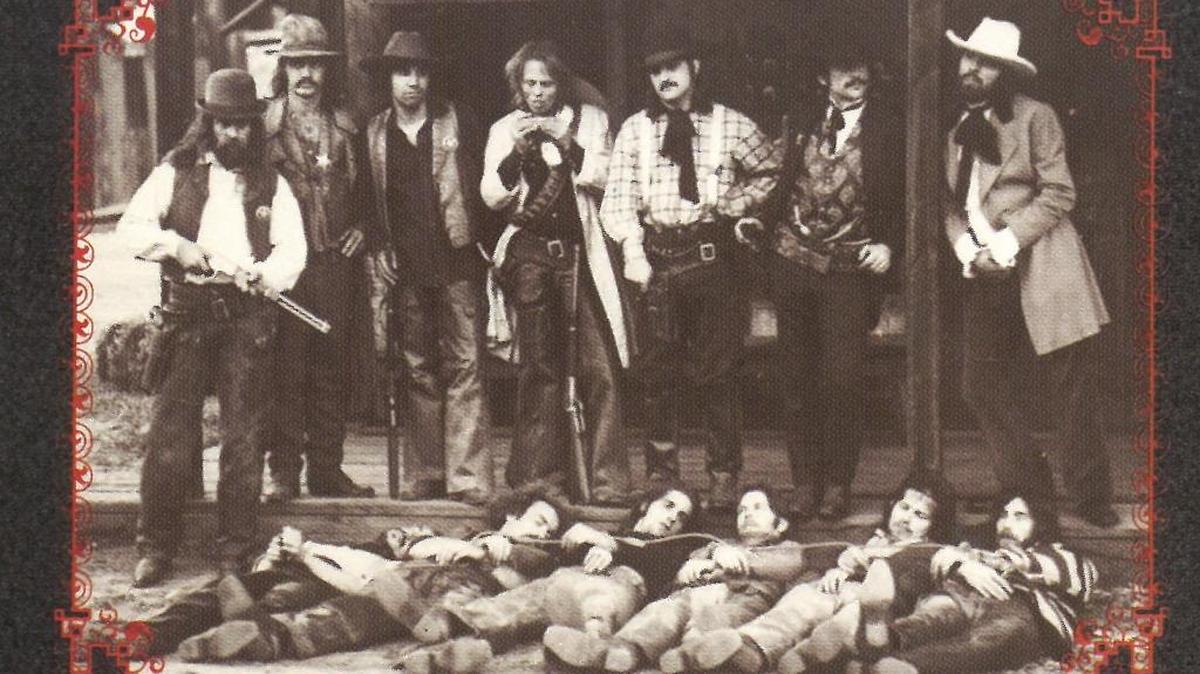 Gary Burden (art), Larry Penny (roadie), Richard Fernandez (road manager), Boyd Elder (artist), Tommy Nixon (roadie), John Hartmann (manager), Glyn Johns (producer). Front: Randy Meisner, Bernie Leadon, Glenn Frey, J.D. Souther, Don Henley, Jackson Browne.