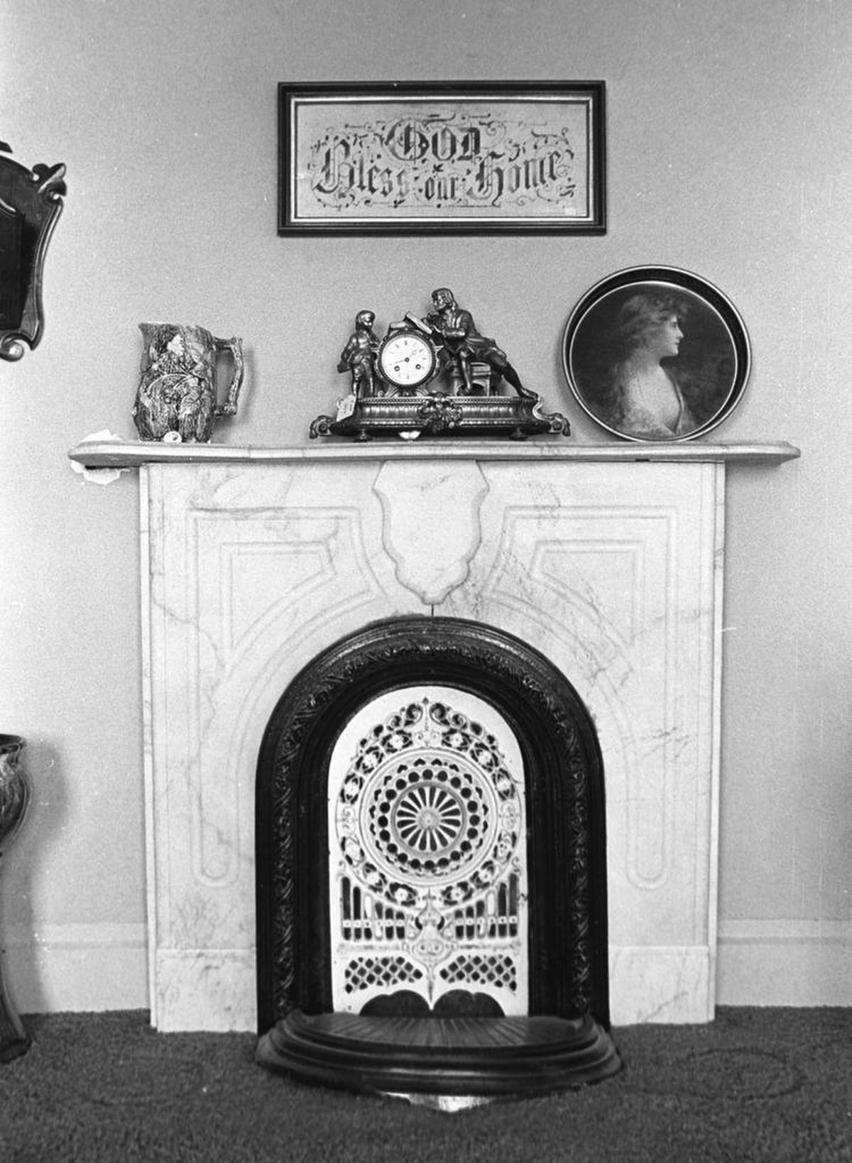 An ornate marble fireplace in the Cass House sitting room burned coal. The Cass house was in need of restoration in 1979, and has since been converted into a bed-and-breakfast inn, restaurant, bakery and wedding/special event venue.