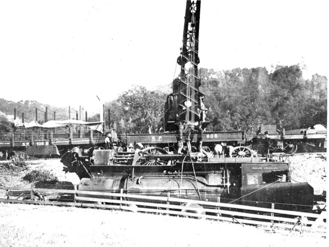 A Southern Pacific work crew gets ready to hoist a steam engine out of a ditch along the Cuesta Grade in a photo that A. Frossard, a longtime railroad employee, dated as 1907. The photo appeared in the May 15, 1956, edition of the Telegram-Tribune.