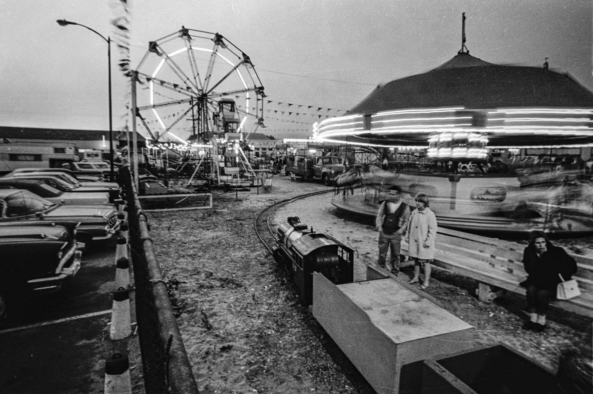 A carnival sits at the entrance of the Pismo Beach Pier on July 4, 1968. The site is currently occupied by the Inn at the Pier.