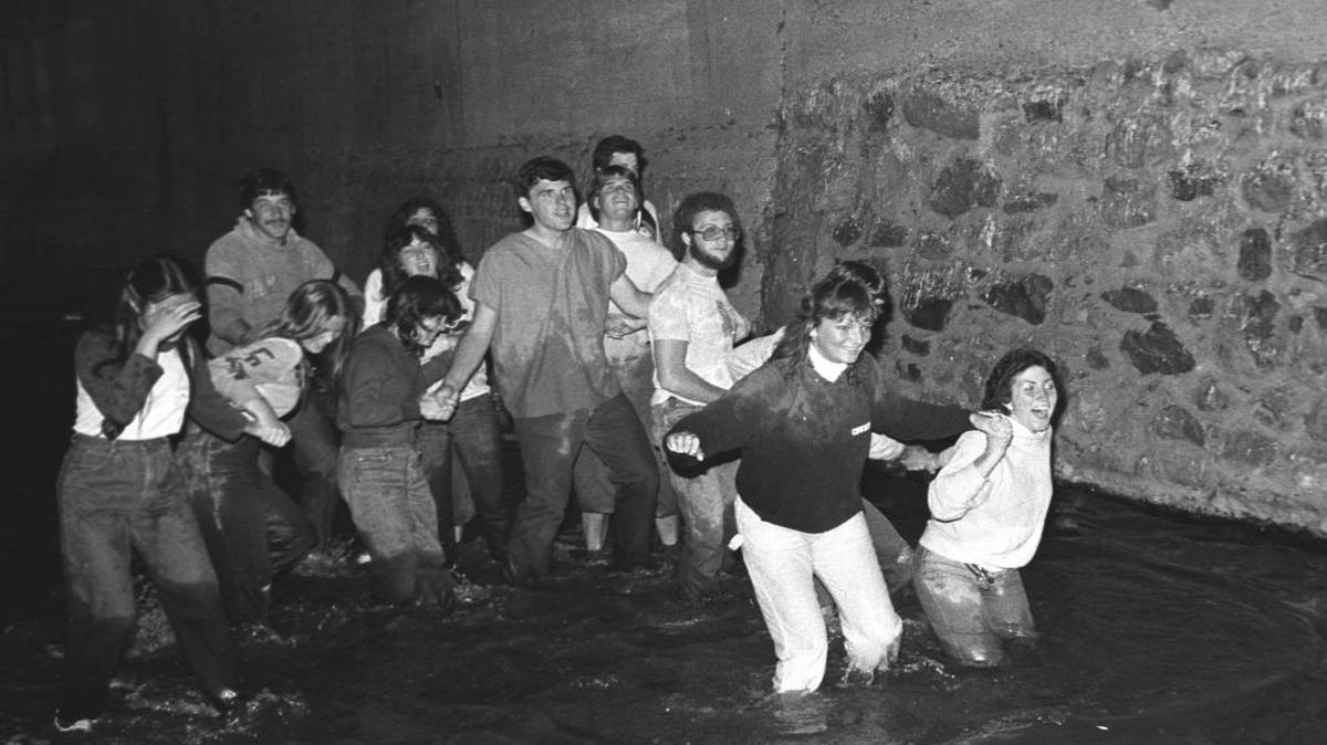 New Cal Poly students take part in the Week of Welcome’s Sewer Tour, a walk through San Luis Creek under the town in 1982.