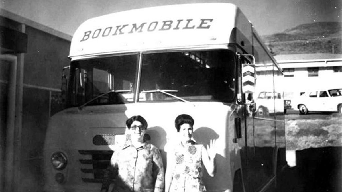 Bookmobile driver Joan Warner, left, and Lily Grabil, bookmobile attendant, in 1972 or early 1973.