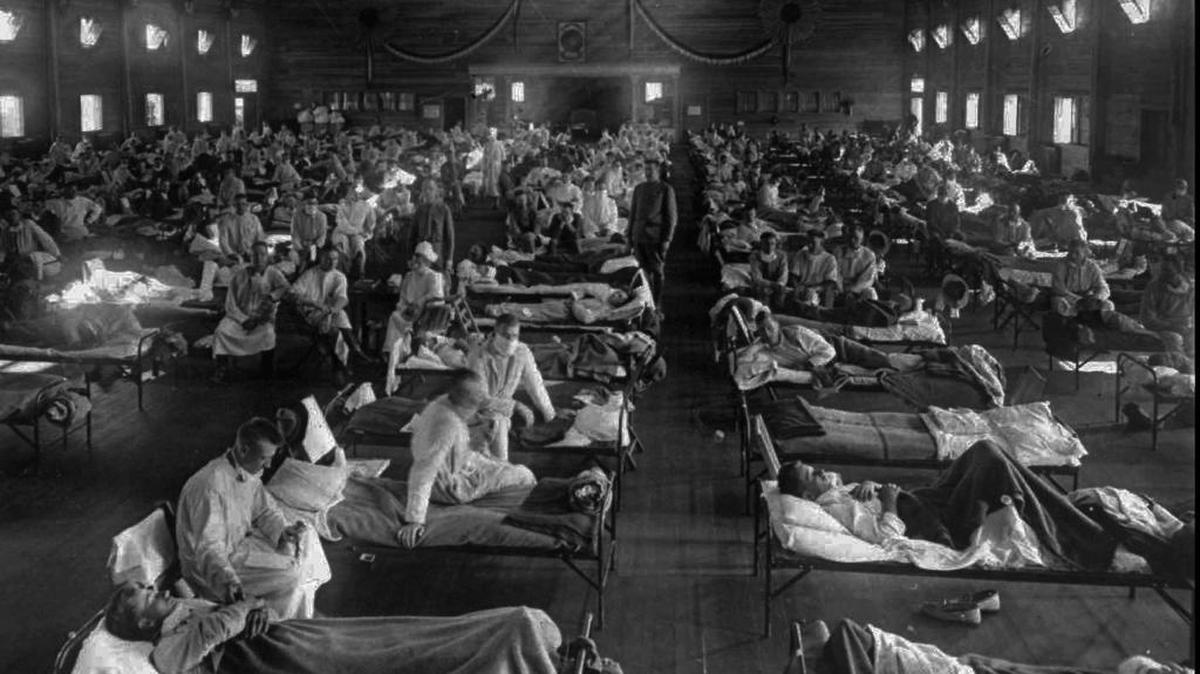 Influenza victims crowd into an emergency hospital near Fort Riley, Kansas in this 1918 file photo. The 1918 Spanish flu pandemic killed at least 20 million people worldwide.