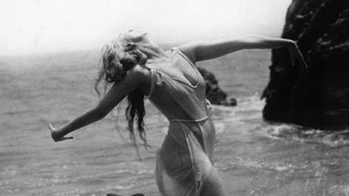 Ruth St. Denis dances in the surf at Atascadero Beach in Morro Bay in 1916. E.G. Lewis took the modern dance pioneer to Atascadero Beach when she visited a friend at his Colony.