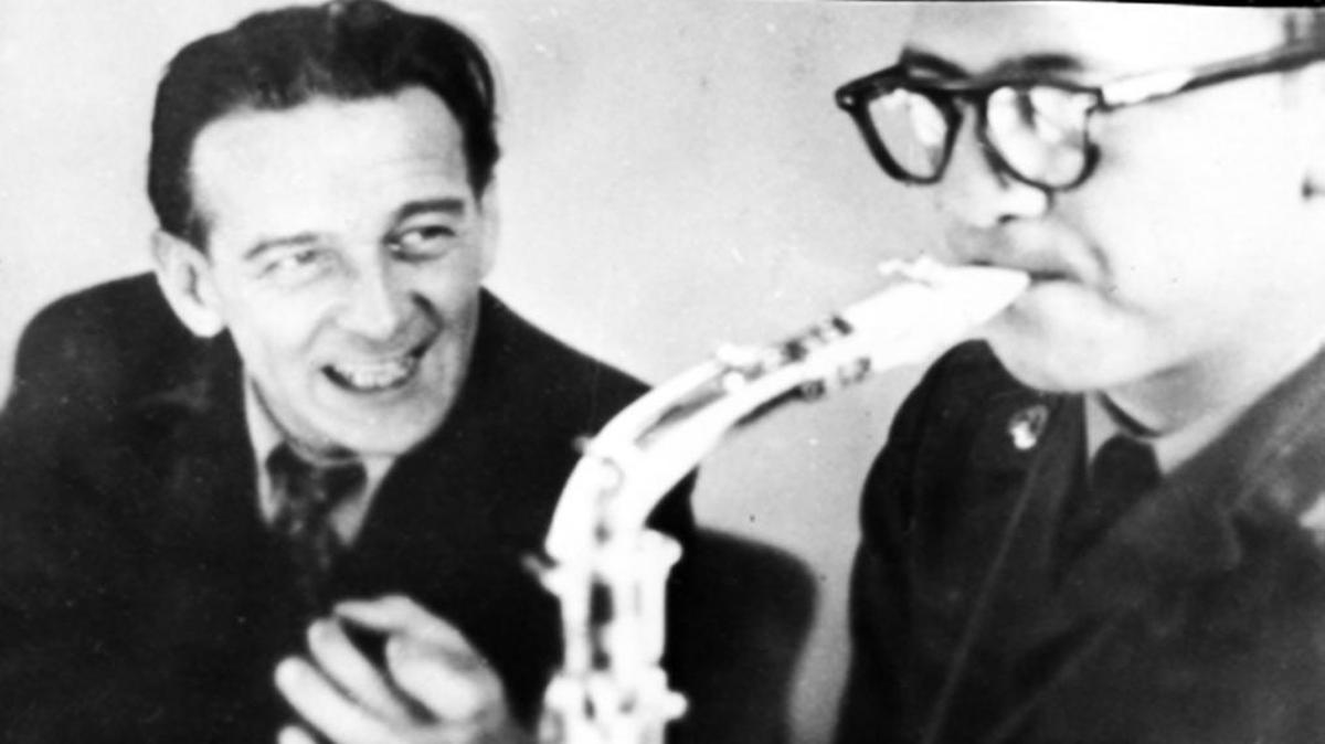 Jack Pierce, in Army uniform, receives saxophone instruction from a professor at the Munich Opera Conservatory in 1951.