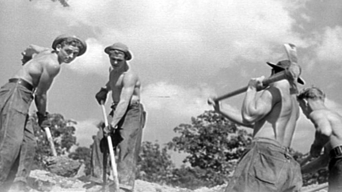 Civilian Conservation Corps workers dealing with flood damage in Arroyo Grande Valley during the winter rainfall season in 1934-35.