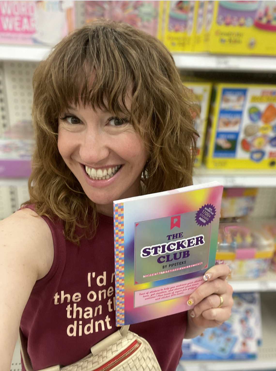 Pipsticks founder Maureen “Mo” Vazquez, showing off the company’s new Sticker Club book available at Target.