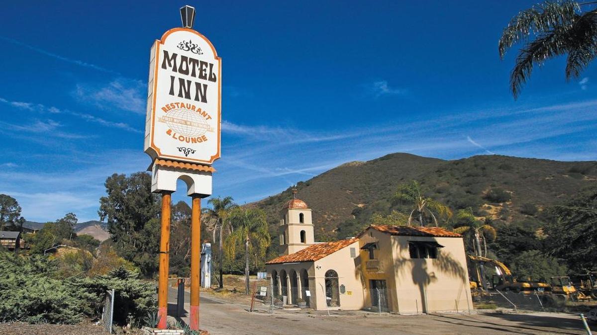The Motel Inn in San Luis Obispo is the subject of an art exhibit at History Center of San Luis Obispo County Museum. The exhibit closes Monday.