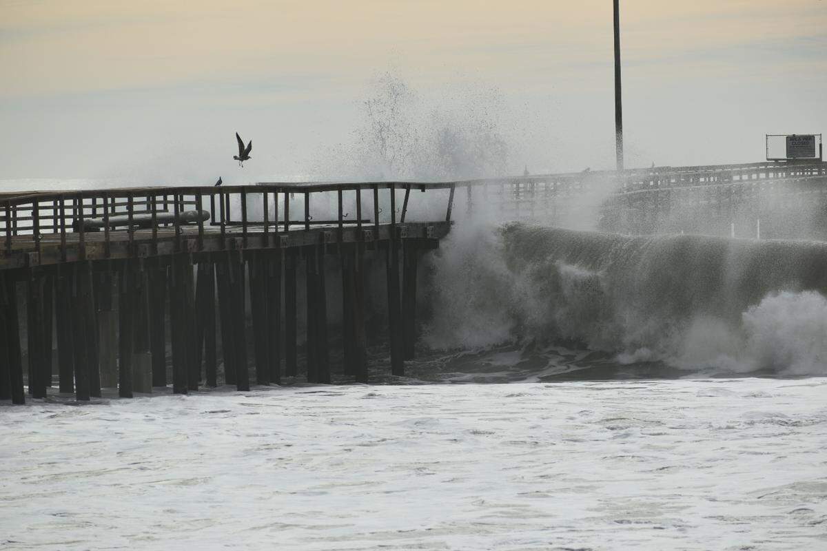Large waves hammer the Avila Beach Pier on Thursday, Dec. 29, 2023.