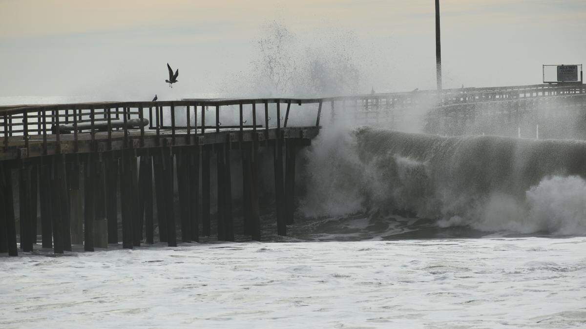 Large waves hammer the Avila Beach Pier on Thursday, Dec. 29, 2023.