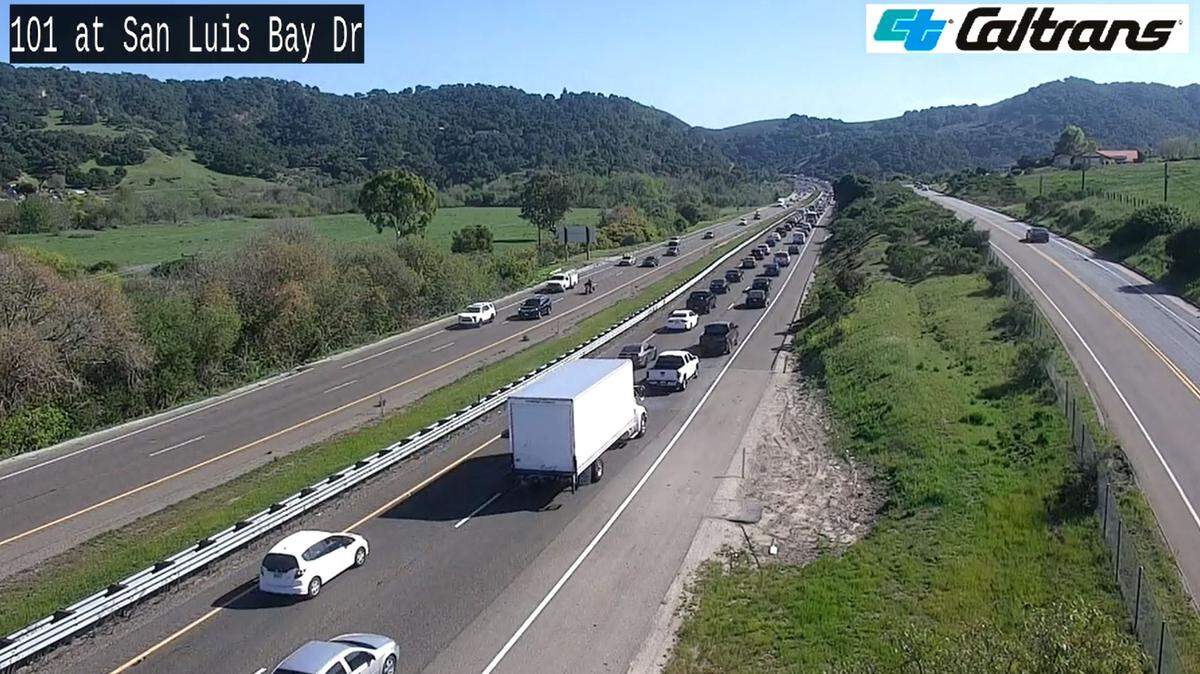 A Caltrans traffic camera shows traffic slowing on southbound Highway 101 near the Avila Beach Drive off-ramp, where a two-vehicle collision occurred.