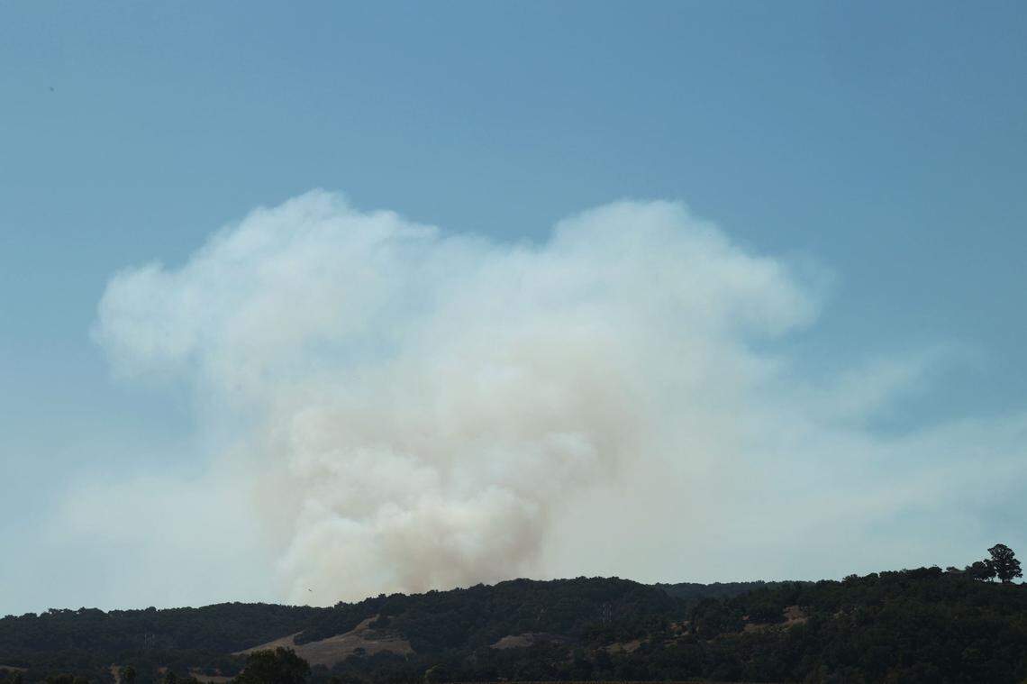 A column of smoke rises over the hills near San Luis Obispo in a view from Buckley Road as Cal Fire conducts a controlled burn east of Pismo Beach on Tuesday, Oct. 3, 2023.