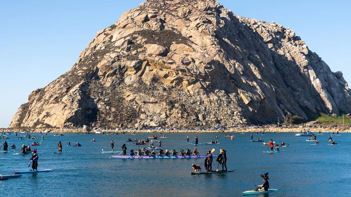 Hundreds of people turned out for the 10th annual Witches and Warlocks Paddle in Morro Bay on Oct. 29, 2023.