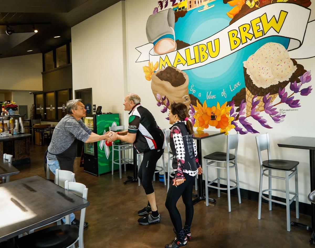 Co-owner Paul Say greets customers at Malibu Brew Coffee’s new location. The Atascadero coffee shop reopened on Wednesday on East Mall following a two-month closure. The business moved across the street to make room for the La Plaza mixed-use development on El Camino Real.