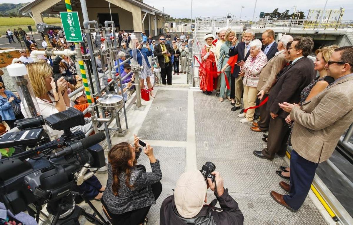 County officials cut the ribbon as part of a grand opening ceremony for the sewage treatment plant in Los Osos on Friday.