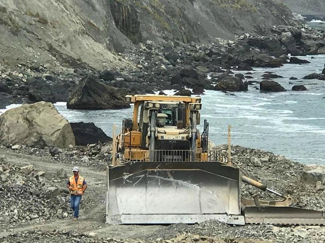 A bulldozer works at the Mud Creek site in August. At the Big Sur slide in 1983 (the biggest slide on along Highway 1 before Mud Creek), nearly 30 bulldozers pushed 3 million cubic yards of rock and earth into the ocean, but Caltrans no longer uses that approach to dealing with mudslides.