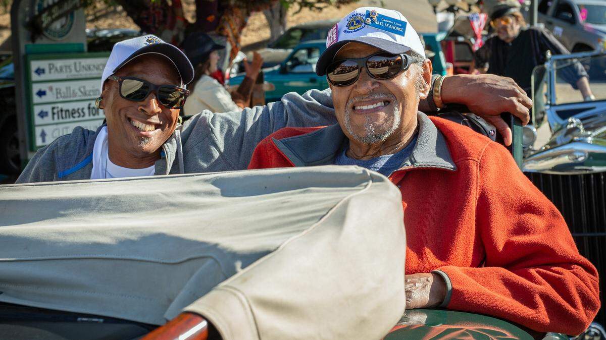 Nate Fearonce of Cambria, founder of the town’s Pinedorado car show, gets ready to ride in the event’s parade as its 2019 parade marshal. Accompanying him in one of Leland Powel’s antique cars is Andre Fearonce, the marshal’s son.