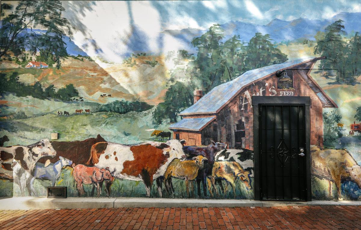 The dairy mural on the side of the Spike's building may be changed as part of the Creamery upgrade.