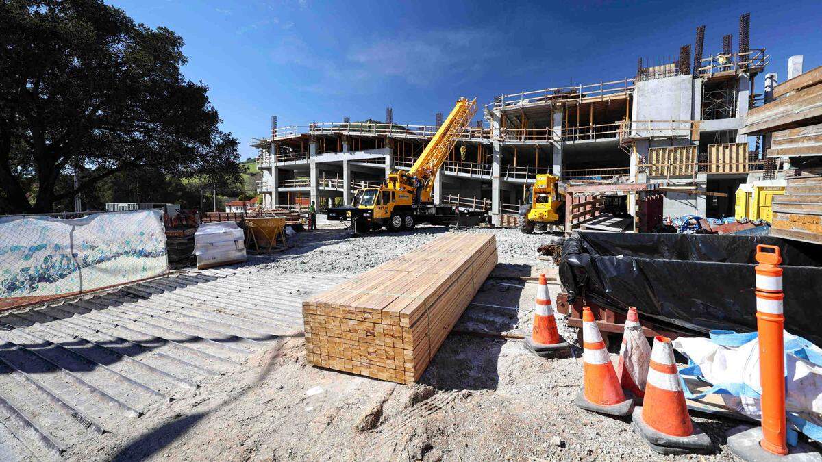 Cultural Arts District Parking Structure takes shape on Feb. 24, 2025. Part of the project includes a theater complex for San Luis Obispo Repertory Theater, to be built on the empty lot filled here by construction materials.