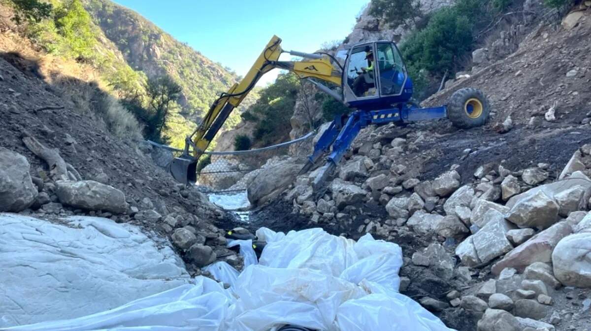 Specialized heavy equipment was used to clean out the debris net in upper San Ysidro Canyon. The group that installed debris nets in the canyons above Montecito in the wake of the deadly 2018 debris flows has decided to remove the devices after failing to reach a financial agreement with Santa Barbara County for their future maintenance and upkeep.