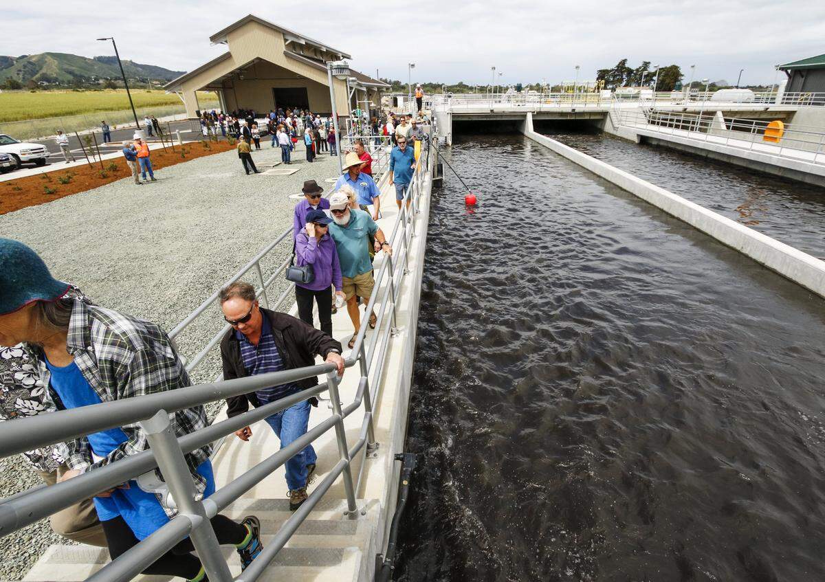 Visitors tour the new Los Osos sewage treatment plant as county officials held a grand opening of the facility on Friday.