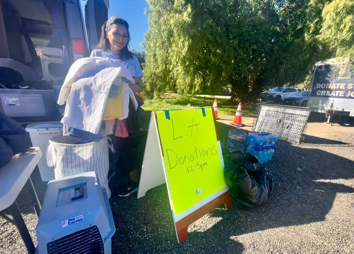 Del Owen, of San Luis Obispo, gathers donations for people displaced by the devastating fires raging in Southern California in January 2025.