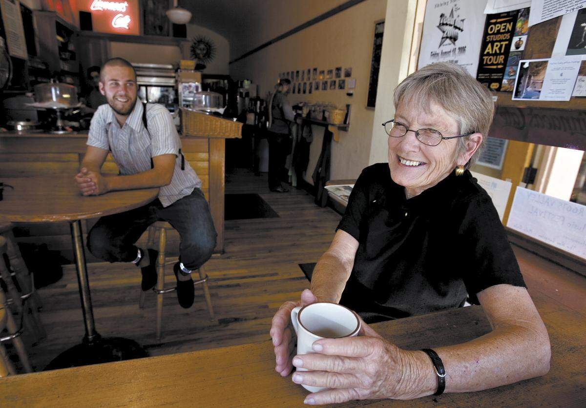 Linnaea Phillips, who founded her now-iconic Linnaea’s Cafe in downtown San Luis Obispo in 1984, poses for a picture there for a profile of her published in The Tribune in 2000.