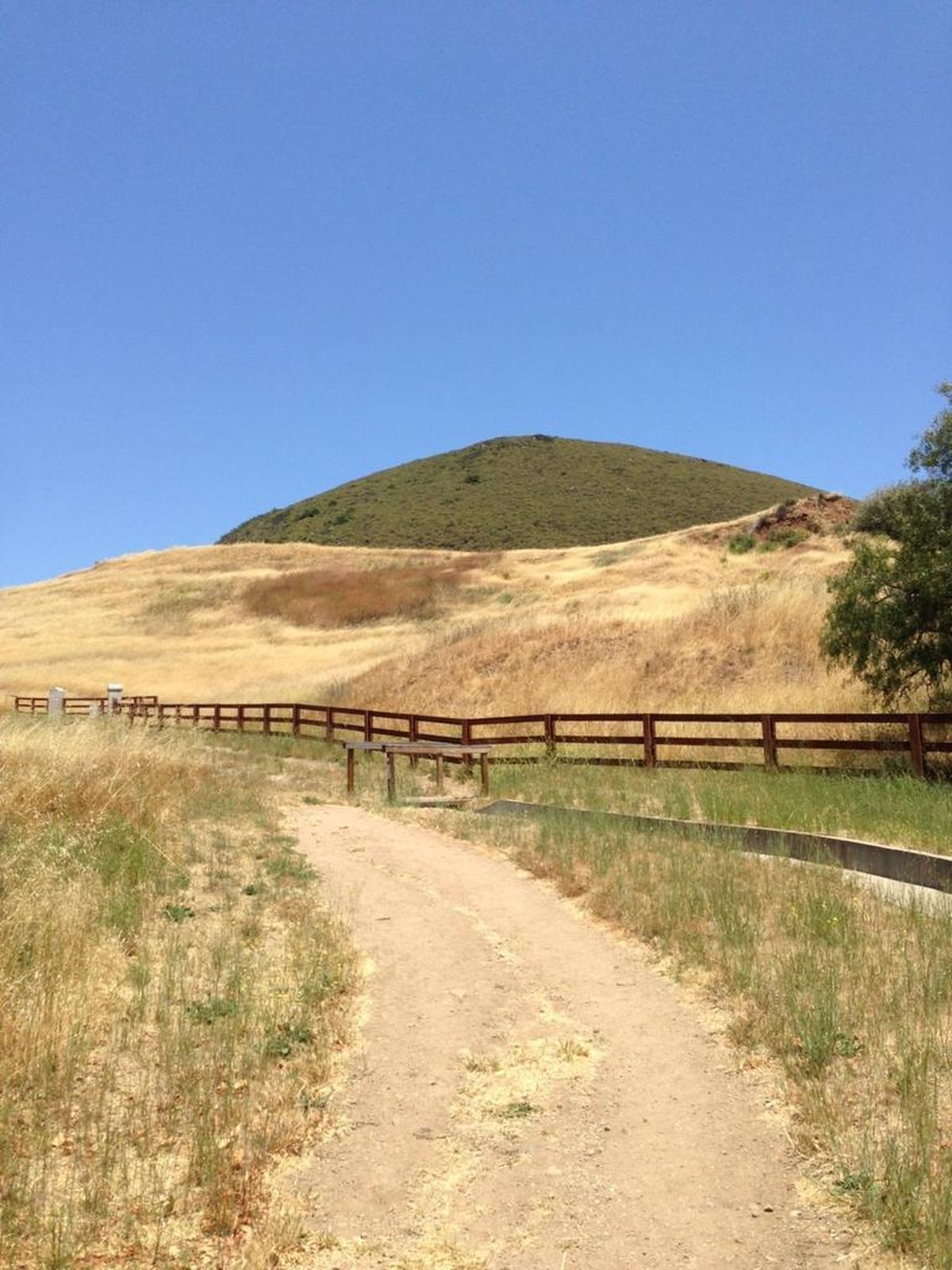 Those who hike Islay Hill Open Space's 1.8-mile trail will be greeted with stunning views of Edna Valley in southern San Luis Obispo. The footbridge pictured above marks the beginning of the trail.