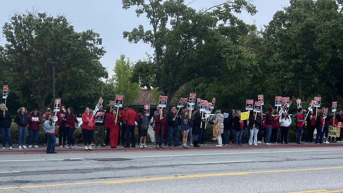 Paso Robles teachers picket along Niblick Road on Tuesday, May 7, 2024.