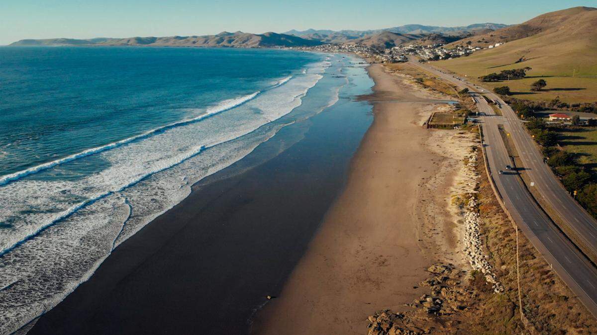 A multi-use trail connecting Cayucos and Morro Bay will offer scenic views of the coast along Highway 1, replacing dirt paths with a safe route away from the highway. The $12 million project needs to secure another $2 million state grant before construction can start in 2027.
