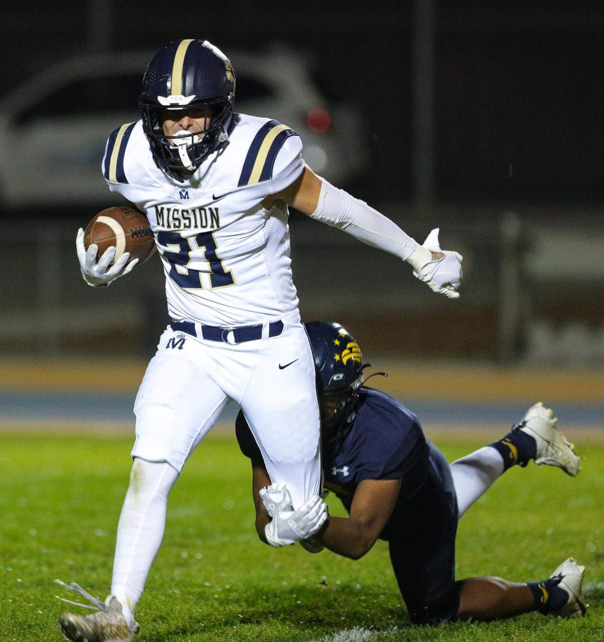 Drew Harrigan is brought down by Bohdan Armstrong. Arroyo Grande High School beat Mission Prep 10-3 in a football game Oct. 13, 2023.