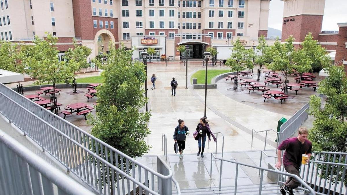Students walk through Poly Canyon Village at Cal Poly on May 17, 2011. The complex, constructed in 2007, was the last housing project that Cal Poly built. Some San Luis Obispo residents say that Cal Poly had increased enrollment for years without adding any new dorms.