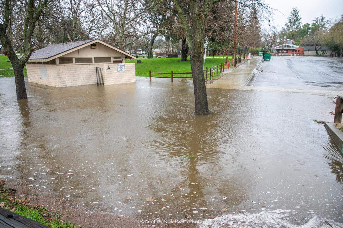 Heavy rains flood the restrooms at Atascadero Lake Park on Jan. 9, 2023.