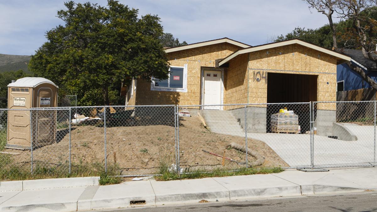 This new house being built on Orange Drive in San Luis Obispo has a single-car garage and limited parking. It's an example of congestion and neighborhood quality-of-life concerns, slow-growth advocates say.