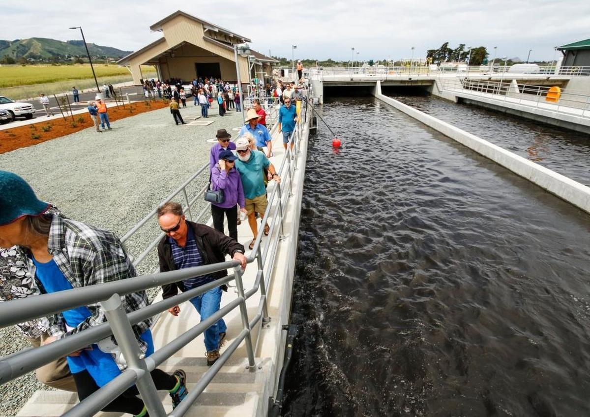 Visitors tour the new Los Osos sewage treatment plant during its grand opening in April 2016. The county is proposing a rate increase at Tuesday’s Board of Supervisors meeting.