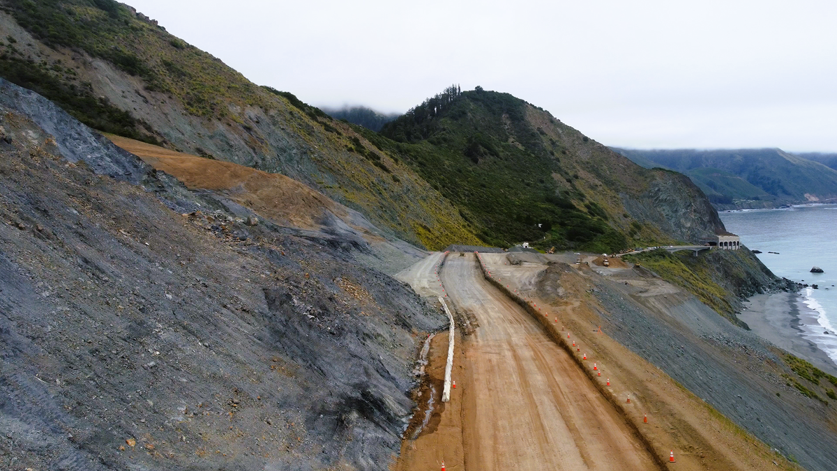 The new road at Paul’s Slide on Highway 1 will be higher than the original road, which allows construction crews to install better drainage systems under that half-mile section of the road.