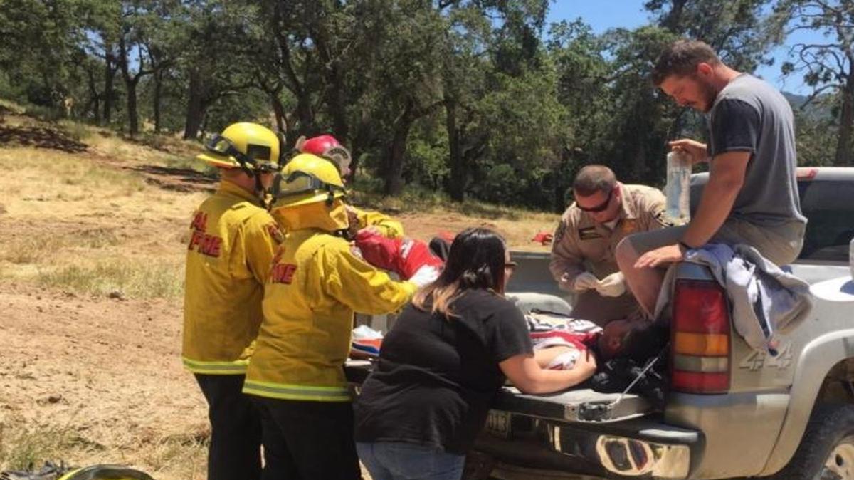 A dirt bike rider who was injured in an accident near Lake Nacimiento on Saturday had to be taken to a California Highway Patrol helicopter by pickup truck before being airlifted to a hospital.