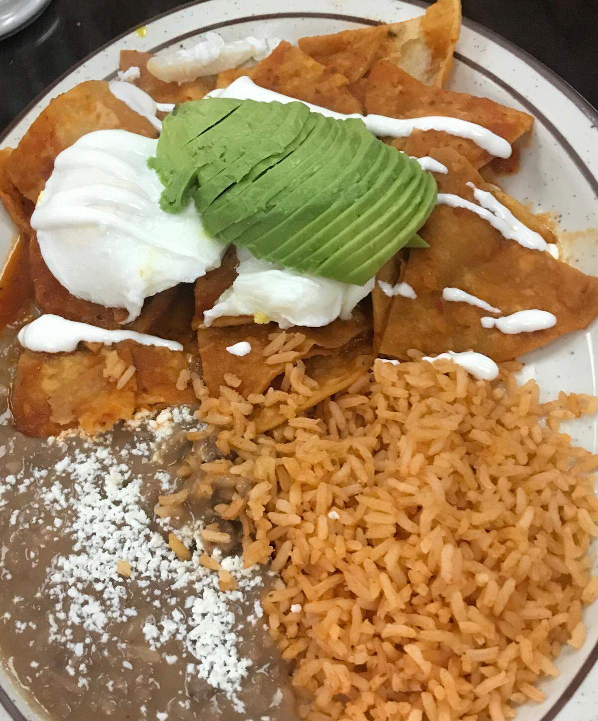 Cambria Cafe’s chilaquiles (served at breakfast and lunch) can be further adorned with chicken or carne asada.