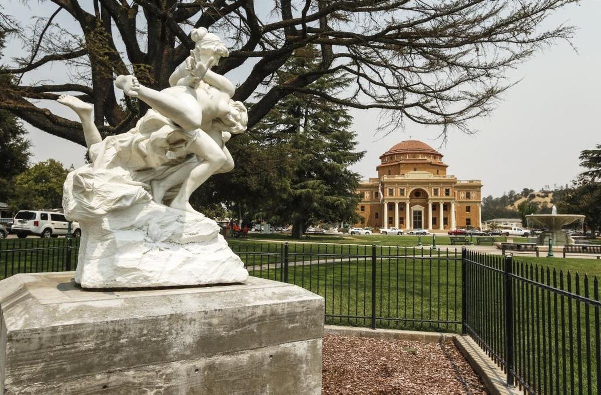 A statue in Atascadero’s Sunken Gardens, as pictured in 2016 with a view of City Hall in the background.